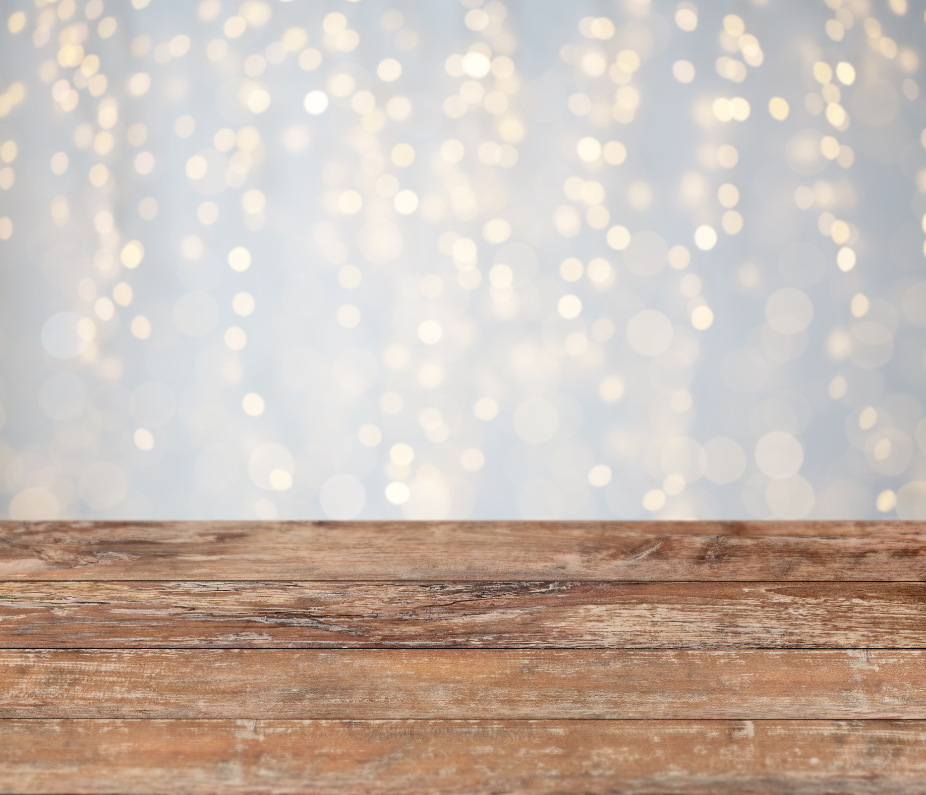 Empty Wooden Table with Christmas Golden Lights