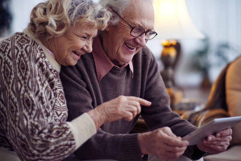 Elder Couple Networking Together